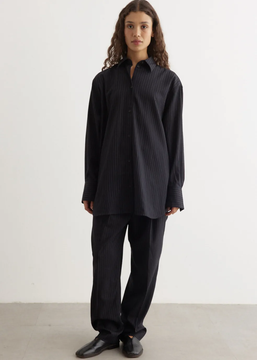 Double-Pleated Tailored Pinstripe Trousers