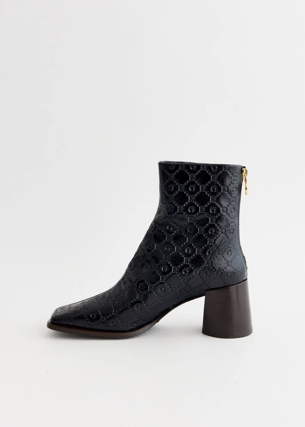 Moonogram Embossed Leather Block Boots