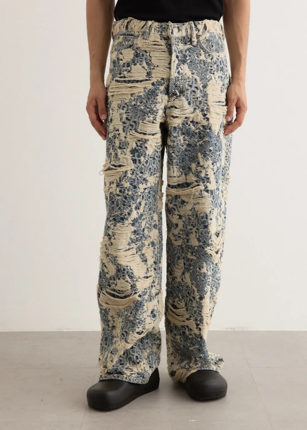 1981U Distressed Monogram Denim Jeans